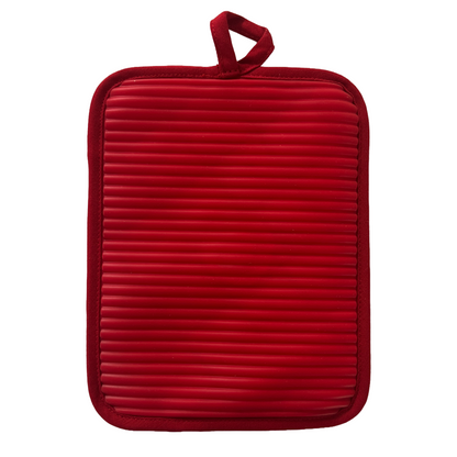 Red pot holder with textured surface and handle on a white background